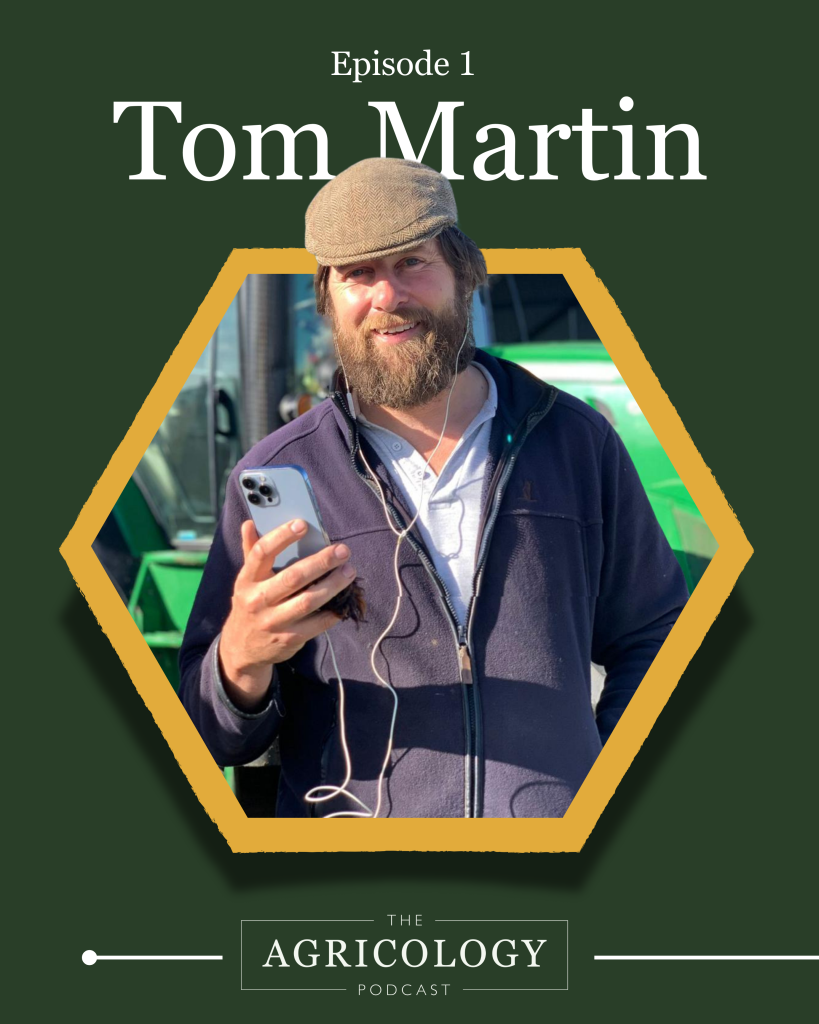 Photo of Tom Martin standing in front of a tractor wearing headphones connected to a smart phone with the text 'Episode 1: Tom Martin. The Agricology Podcast'