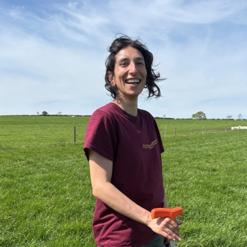Giulia standing in a field