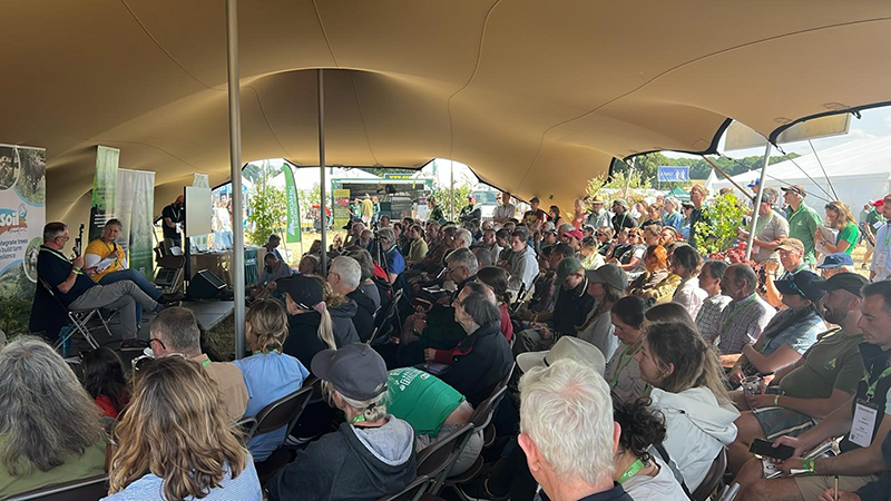 A full tent of people listening to Lindsay Whistance talking to Clive Thomas